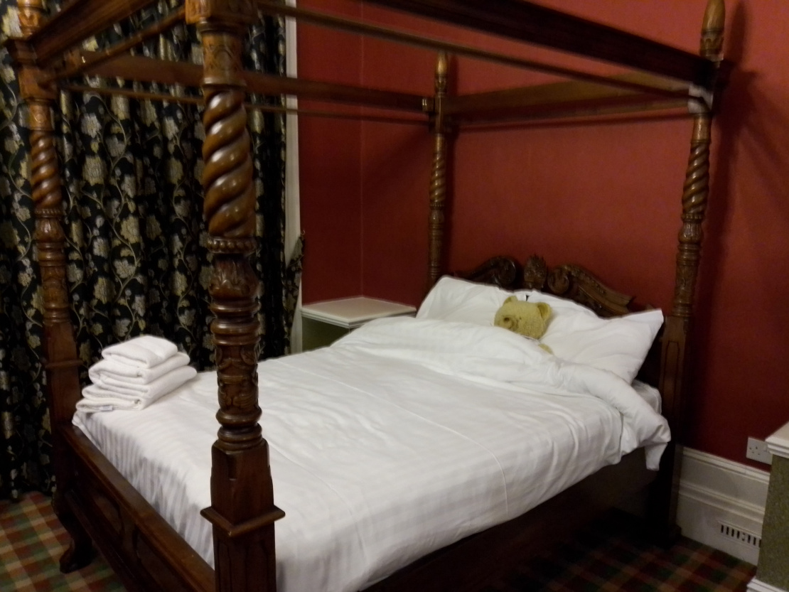 Big Mac relaxing in double bed