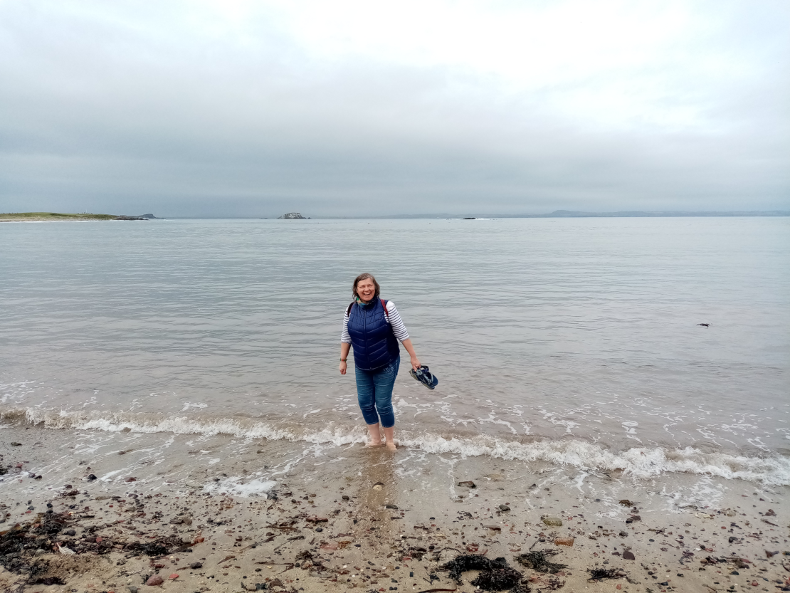 Mum paddling in the sea